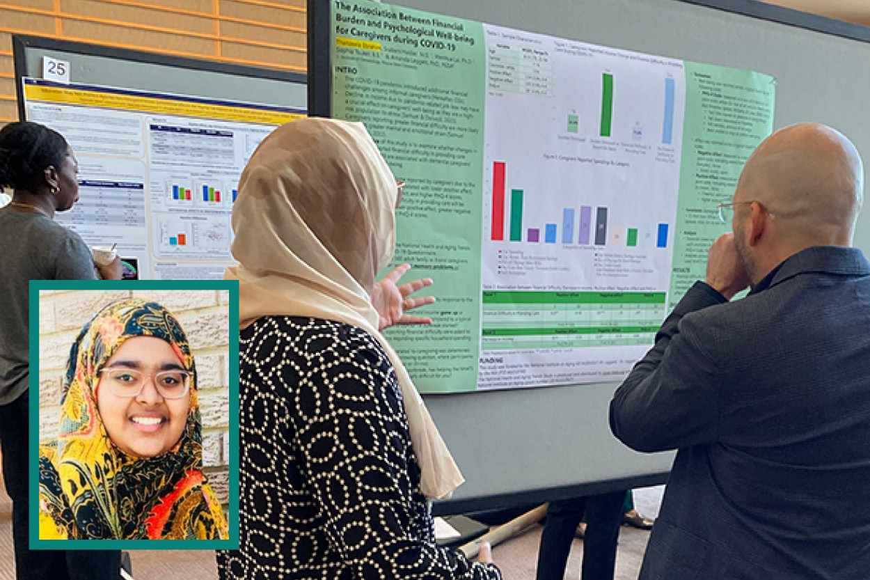 Undergrad Thanzeela Ebrahim showing off a data chart.